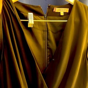 Jlo black jumpsuit. Day and evening jumpsuit used. No stains or tear.